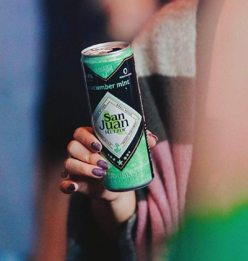 Cucumber Mint can in hand